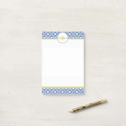 Sand-Dollar mit blauem u. weißem Blumen- u. Post-it Klebezettel (Auf Schreibtisch)