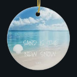 Sand Is The New Snow Beach Christmas Ornament<br><div class="desc">This fun beachliving design Sand is the new snow ornament feature a beach scene with a seashell. Personalize by adding a year.</div>