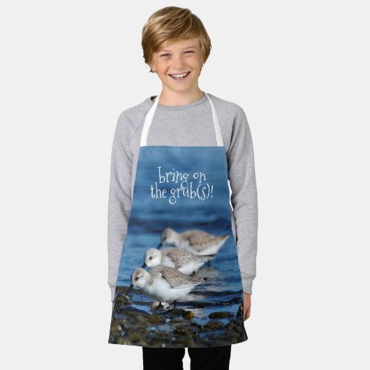 Sanderlings, die in gestaffelter Synchronizität fü Schürze (Getragen)