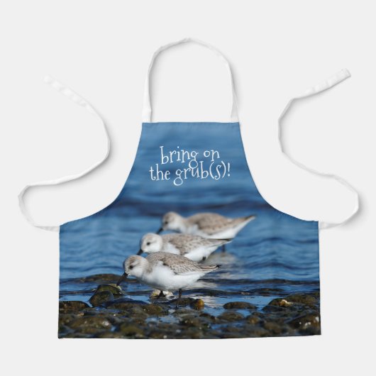 Sanderlings, die in gestaffelter Synchronizität fü Schürze (Vorderseite)