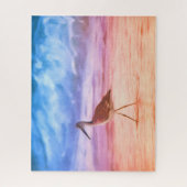 Sandpipers Morgenspaziergang am Strand während des Puzzle (Vertikal)