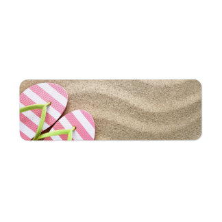 Sandstrand mit Flip Flops