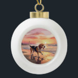 Sandy Paws Beagle Dog on Beach Sunset Keramik Kugel-Ornament<br><div class="desc">Tauchen Sie ein in die ruhige Schönheit unseres Hundes "Sandy Paws and Sunset Hues" mit Sonnenuntergang am Strand. Diese faszinierende Szene vereint das Wesen eines perfekten Abends am Ufer, mit einem treuen Hund, der den goldenen Sand und die atemberaubenden Farben der untergehenden Sonne genießt. Ob Hundeliebhaber oder Sonnenuntergang - dieses...</div>