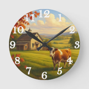 Sanfte Kuh in ländlicher Landschaft Runde Wanduhr