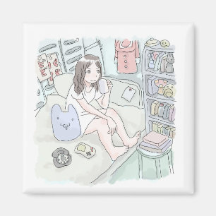 Sani Sanaji sitzt auf einem Bett in einem himmelbl Magnet
