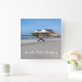 Sankt Peter Ording Haus auf Pfählen am Strand Quadratische Wanduhr (Zuhause)