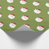 Sankt stellt auf grünem WeihnachtsPackpapier Geschenkpapier (Ecke)