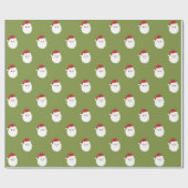 Sankt stellt auf grünem WeihnachtsPackpapier Geschenkpapier (Flach)