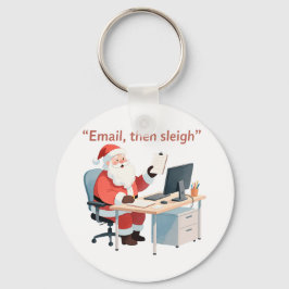 Santa arbeitet an einem Schreibtisch, der Weihnach Schlüsselanhänger