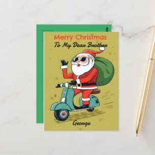 Santa auf einem Scooter mit Sonnenbrille und X-Mas Postkarte