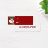 Santa auf grünem Hintergrund mit roten Geschenkanh (Schreibtisch)