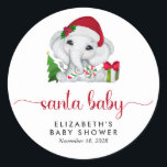 Santa Baby Elephant Christmas Baby Girl Shower Runder Aufkleber<br><div class="desc">Weihnachts-Weihnachtsaufkleber für Ihr Baby-Duschfavoriten und Korrespondenz mit "Santa Baby" in einem stilvollen roten Drehbuch mit Wimpern und einer niedlichen Wasserfarbe eines kleinen Elefanten mit einer Weihnachtsmannmütze,  einem roten und grünen Zuckerrohr und Geschenken. Fügen Sie den Namen und das Duschdatum der Mutter hinzu,  die in einfacher moderner Typografie erscheint.</div>
