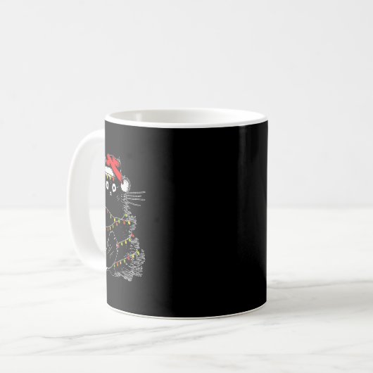 Santa Black Cat hallte in Weihnachtsbaumlicht auf Kaffeetasse (Vorderseite Links)