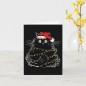 Santa Black Cat hallte in Weihnachtsbaumlicht auf Karte (Gelbe Blume)