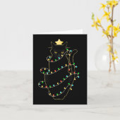 Santa Black Cat hallte in Weihnachtsbaumlicht auf Karte (Gelbe Blume)