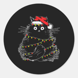 Santa Black Cat hallte in Weihnachtsbaumlicht auf Runder Aufkleber