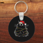 Santa Black Cat hallte in Weihnachtsbaumlicht auf Schlüsselanhänger (Vorderseite)