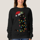Santa Black Cat hallte in Weihnachtsbaumlicht auf Sweatshirt (Vorderseite)