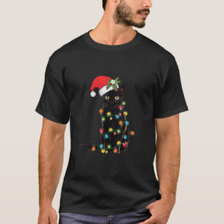 Santa Black Cat hallte in Weihnachtsbaumlicht auf T-Shirt