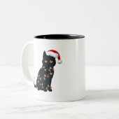 Santa Black Cat hallte in Weihnachtsbaumlicht auf Zweifarbige Tasse (Vorderseite Links)