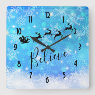 Santa Claus and his Flying Reindeer - Believe Quadratische Wanduhr