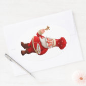 Santa Claus Bakes Gingerbread Männer Ovaler Aufkleber (Umschlag)