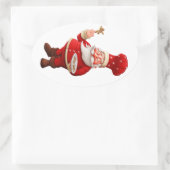 Santa Claus Bakes Gingerbread Männer Ovaler Aufkleber (Tasche)