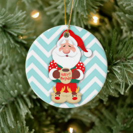 Santa Claus in red pajamas holding a mug Keramik Ornament