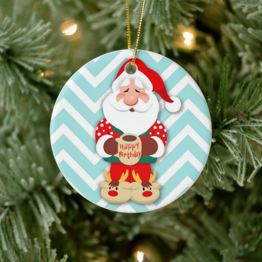 Santa Claus in red pajamas holding a mug Keramik Ornament (Baum)