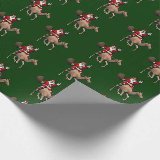 Santa Claus Lieben auf Kameltour Geschenkpapier (Ecke)