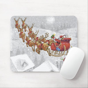Santa Claus riding on sleigh with gift box Mousepad