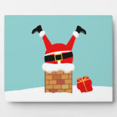 Santa Claus stuck in the chimney on the roof Fotoplatte (Vorderseite)
