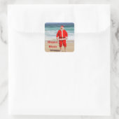 Santa Clause am Strand Warmest wünscht einen sonni Quadratischer Aufkleber (Tasche)
