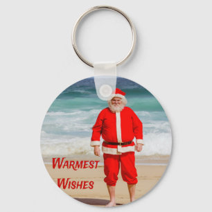 Santa Clause am Strand Warmest wünscht einen sonni Schlüsselanhänger
