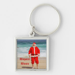 Santa Clause am Strand Warmest wünscht einen sonni Schlüsselanhänger