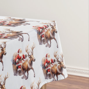 Santa Clause mit einem Rentier, der seinen Schlitt Tischdecke