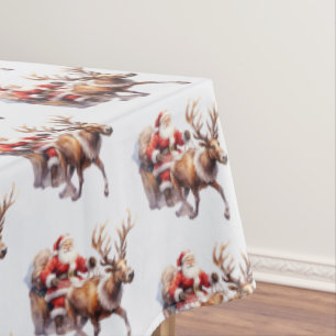 Santa Clause mit einem Rentier, der seinen Schlitt Tischdecke