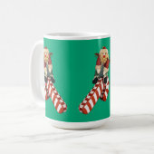 Santa Clause rides candy cane slide for Christmas. Kaffeetasse (Vorderseite Links)