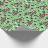 Santa Frenchie Pfotenmuster auf Grün Geschenkpapier (Ecke)