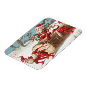 Santa gnomes rutscht auf einem Stein Magnet (Linke Seite)