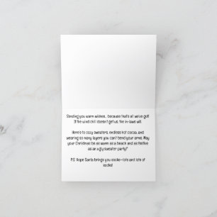 Santa hält Angelrute bei der Hütte Weihnachten 