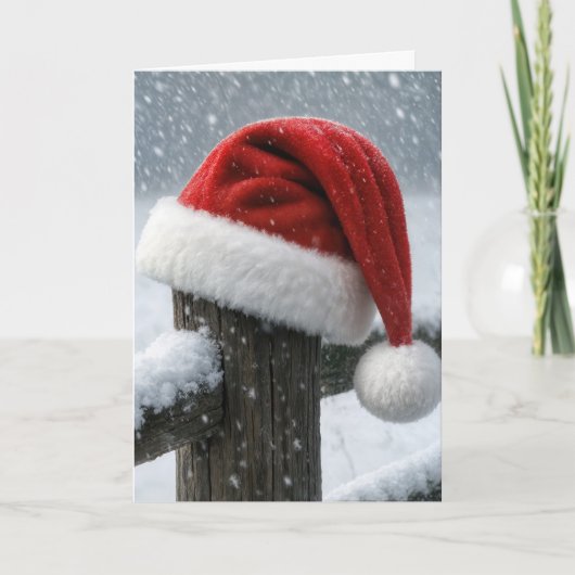 Santa Hat On a Snowy Fence Post Karte (Vorderseite)