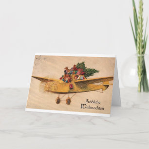 Santa in Flugzeug - Spielzeug - Deutschland 1900er Feiertagskarte