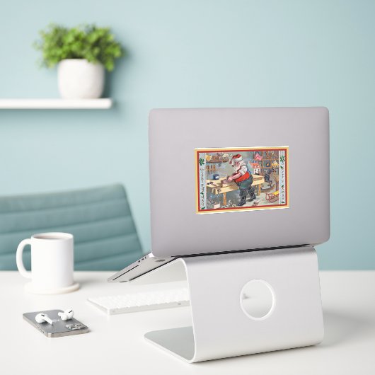 Santa in seiner Werkstatt Aufkleber (Laptop auf Schreibtisch)