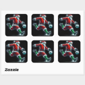 Santa Kicks ein Fußballball im Schnee Quadratischer Aufkleber (Blatt)