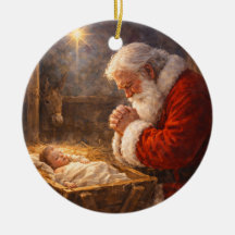Santa kniet an der Krippe Weihnachten
