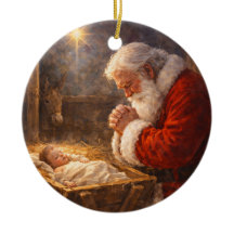 Santa kniet an der Krippe Weihnachten