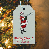 Santa mit Champagnerflasche Geschenkanhänger