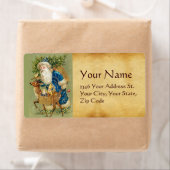 SANTA MIT DEER UND CHRISTMAS GIFTS IM WINTERSCHNEE (Insitu)