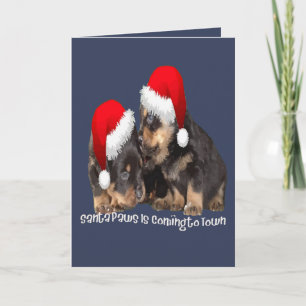 Santa Paws kommt in die Stadt Niedliche Rottweiler Feiertagskarte